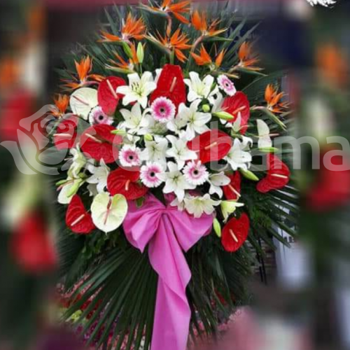 تاج گل تبریک یک طبقه استرلیتزیا لیلیوم ژربرا و آنتوریوم