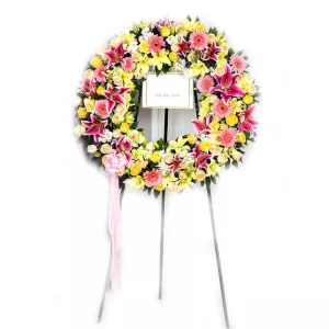 تاج گل تبریک حلقه ای اورینتال ژربرا رز لیلیوم و داوودی